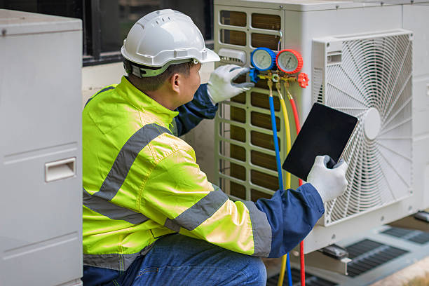 Professional Heat Pump Repair technician working in Saint Albans, MO